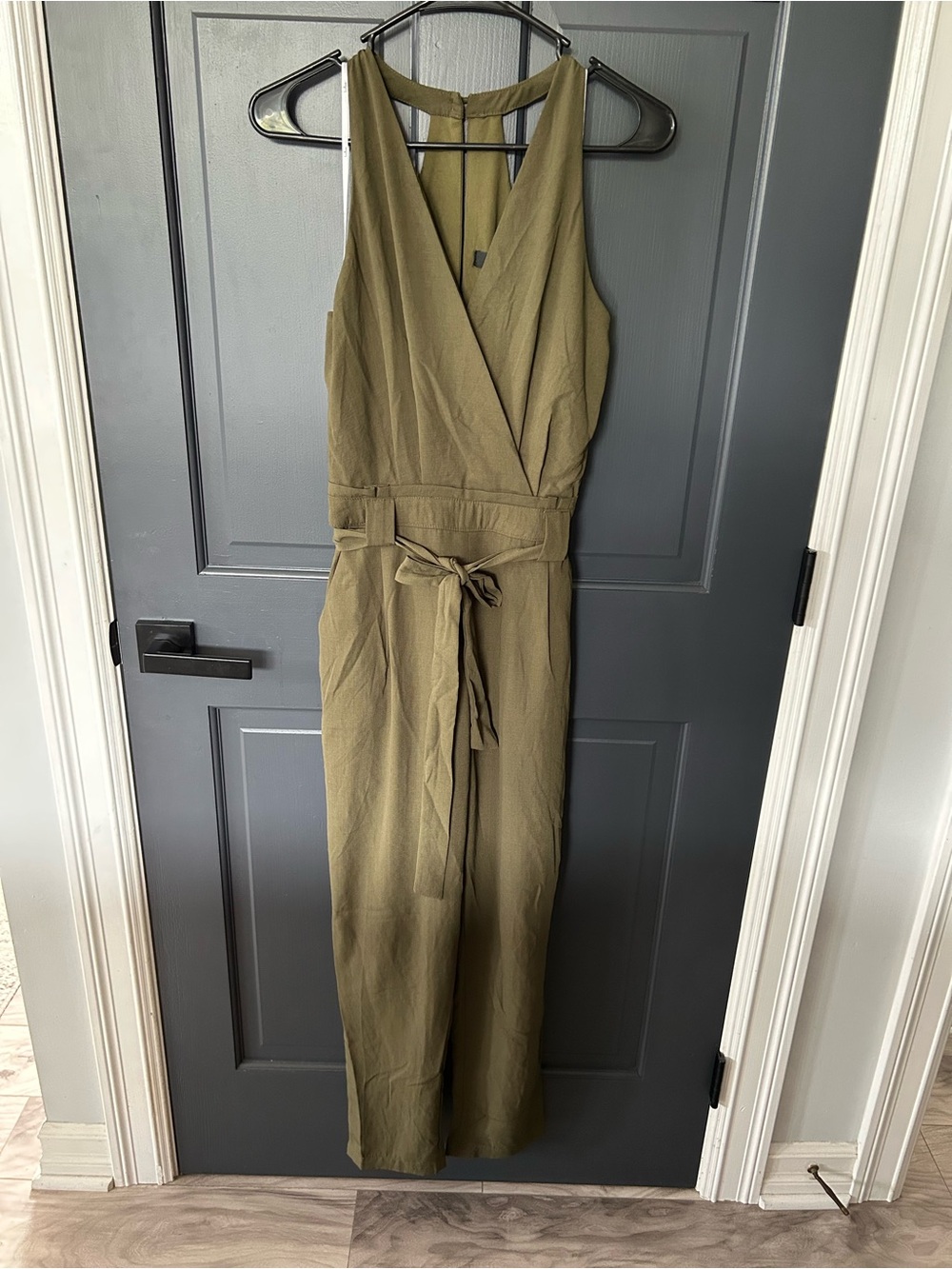 In the City Lulu's Olive Green Sleeveless Wrap Jumpsuit with Waist Tie